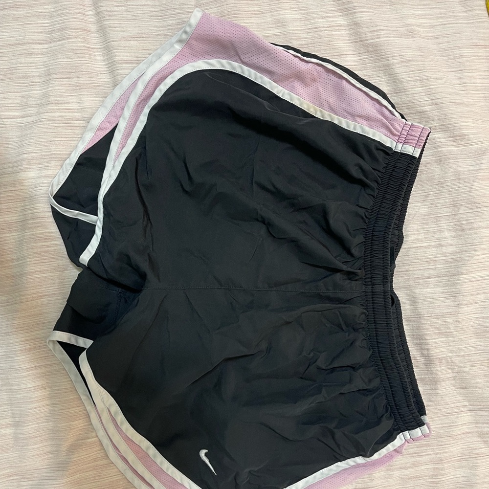 Nike running shorts size large. Black and light pink